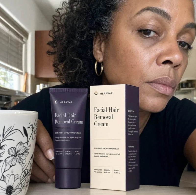 Meravae customer holding Facial Hair Removal Cream
