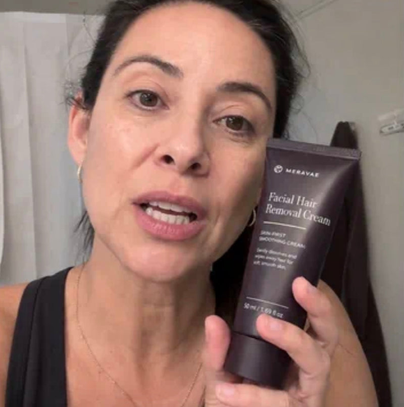 Meravae customer holding Facial Hair Removal Cream